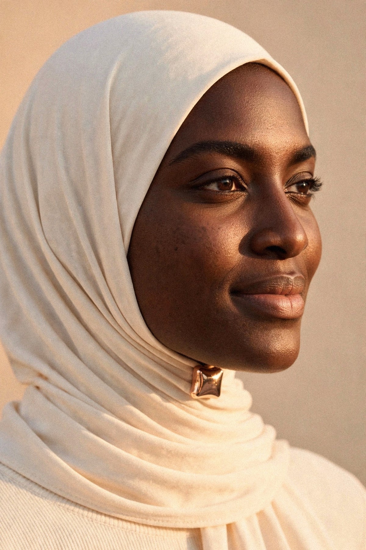 Metallic Hijab Magnets shown fastening a hijab under the chin