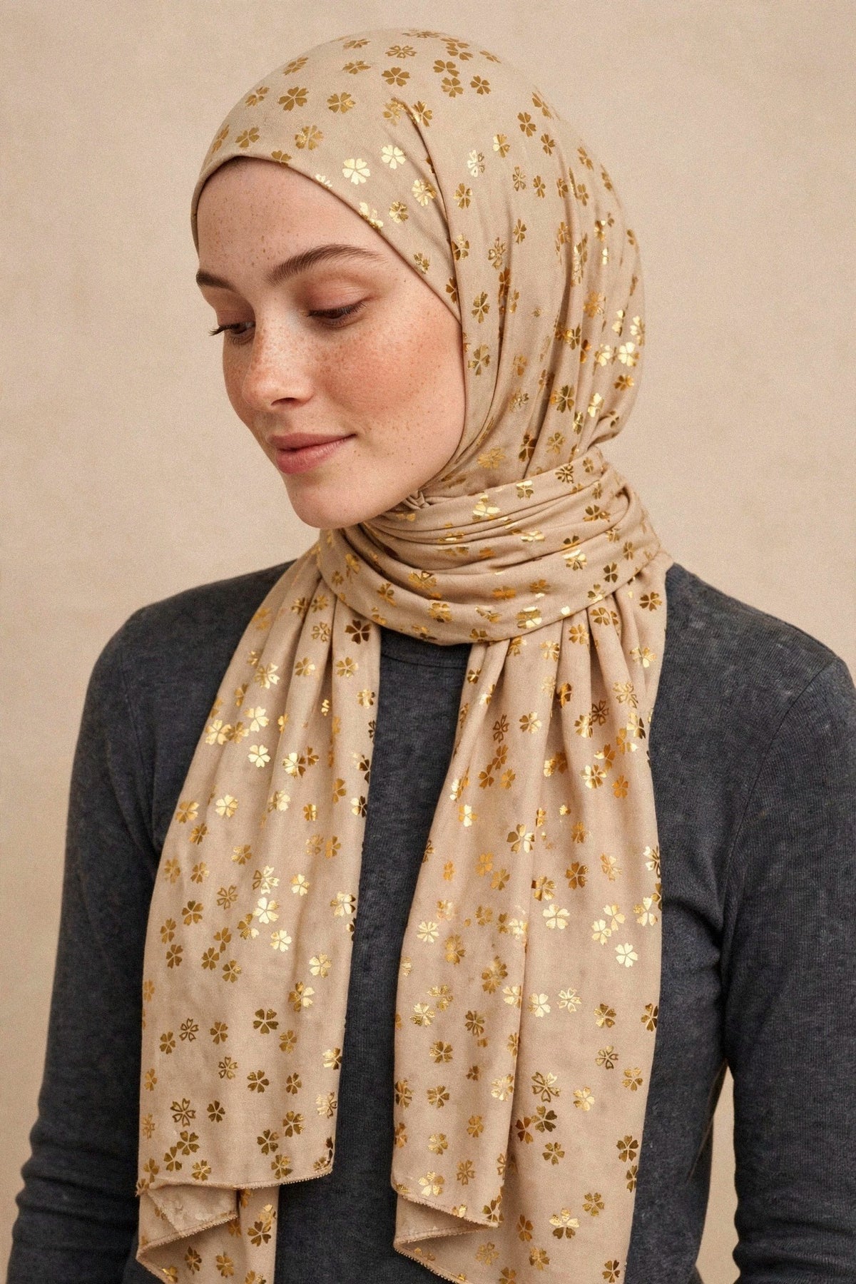 Model wearing the Beige - Floral Imprints Hijab