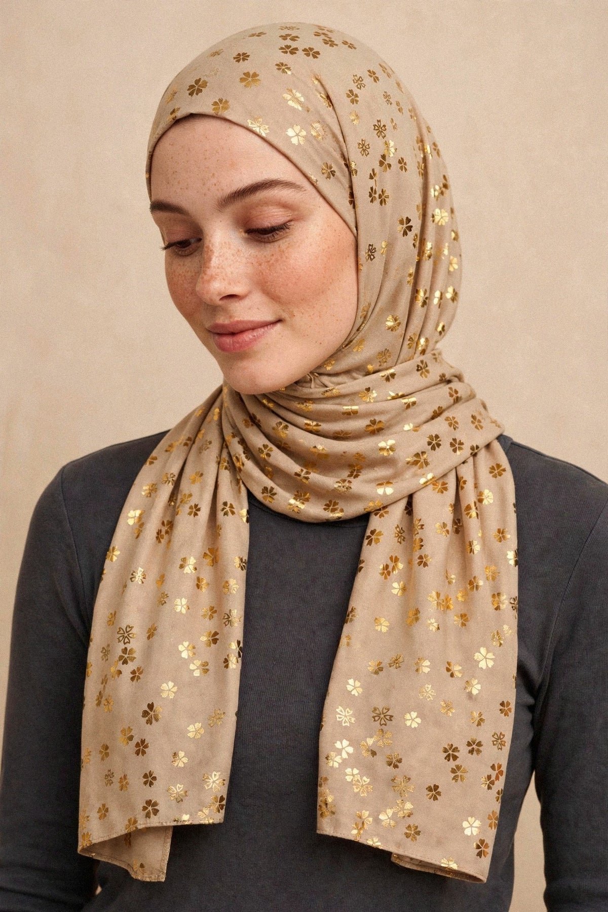 Model wearing the Beige - Floral Imprints Hijab