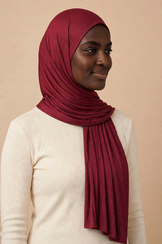 Model wearing the Berry ribbed jersey hijab styled with a cream top - Concealed Muslimah