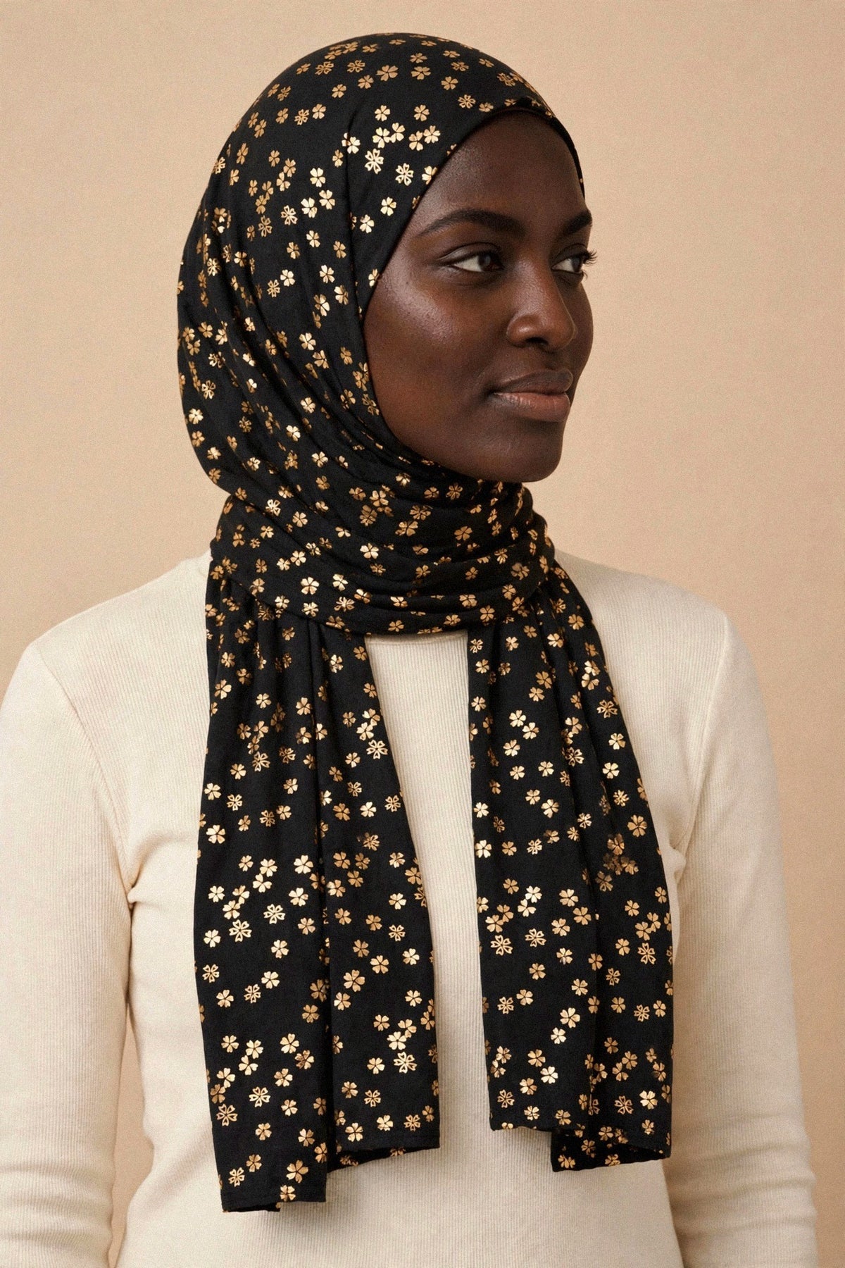 Model wearing the Black - Floral Imprints Hijab
