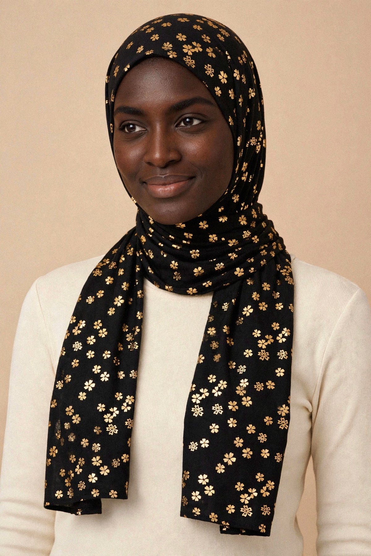 Model wearing the Black - Floral Imprints Hijab