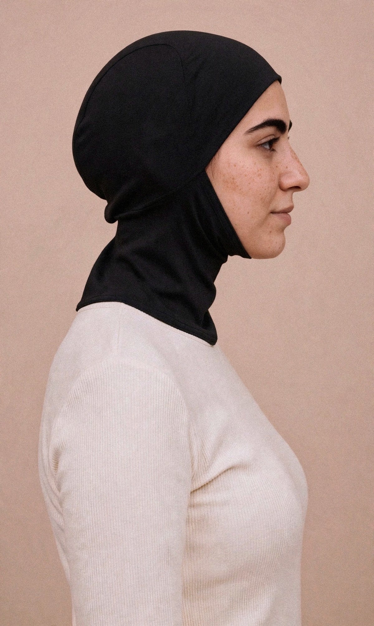 Black - Ninja Underscarf worn by a model — side view