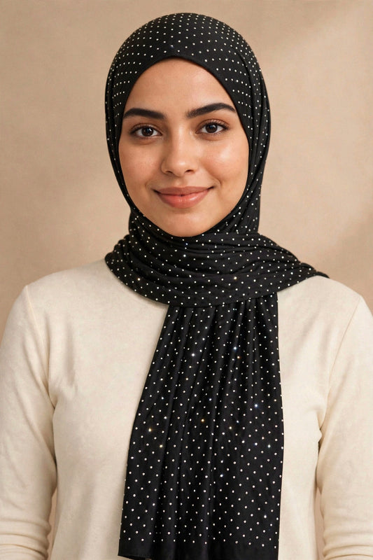 Model wearing the Black silken diamonds hijab styled with a cream top - Concealed Muslimah