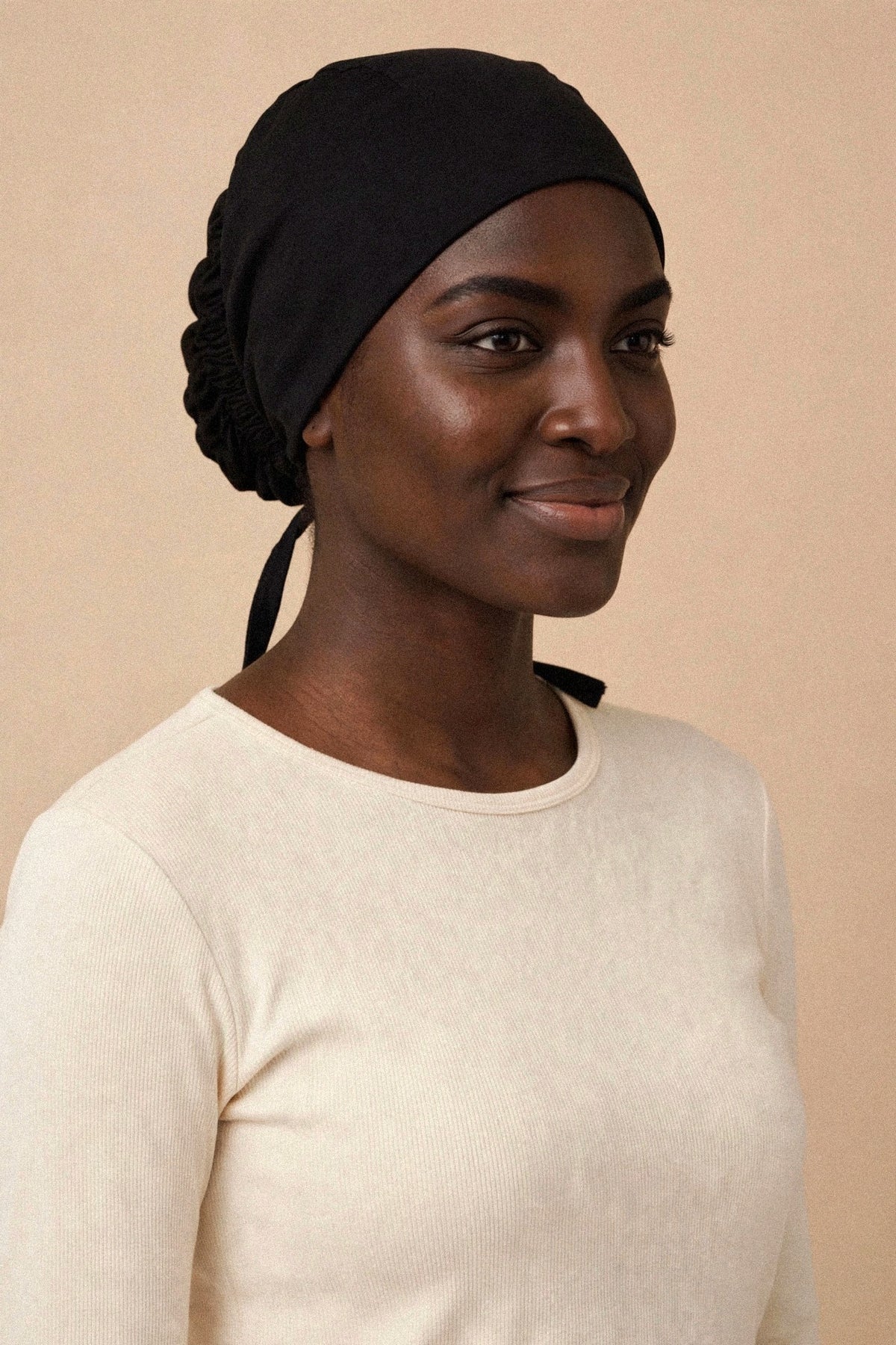 Model wearing the Black - Tie-Back Underscarf