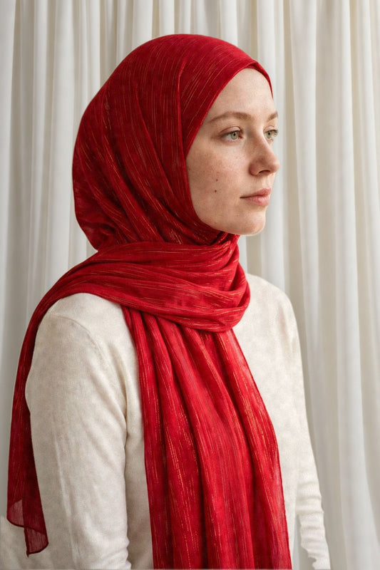 Model wearing the Blood Red timeless edition hijab styled with a white top - Concealed Muslimah