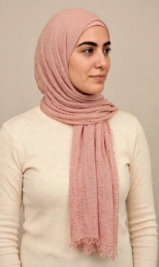 Model wearing the Blush Pink crimple hijab - Concealed Muslimah