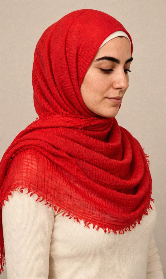 Model wearing the Bright Blood Red crimple hijab - Concealed Muslimah
