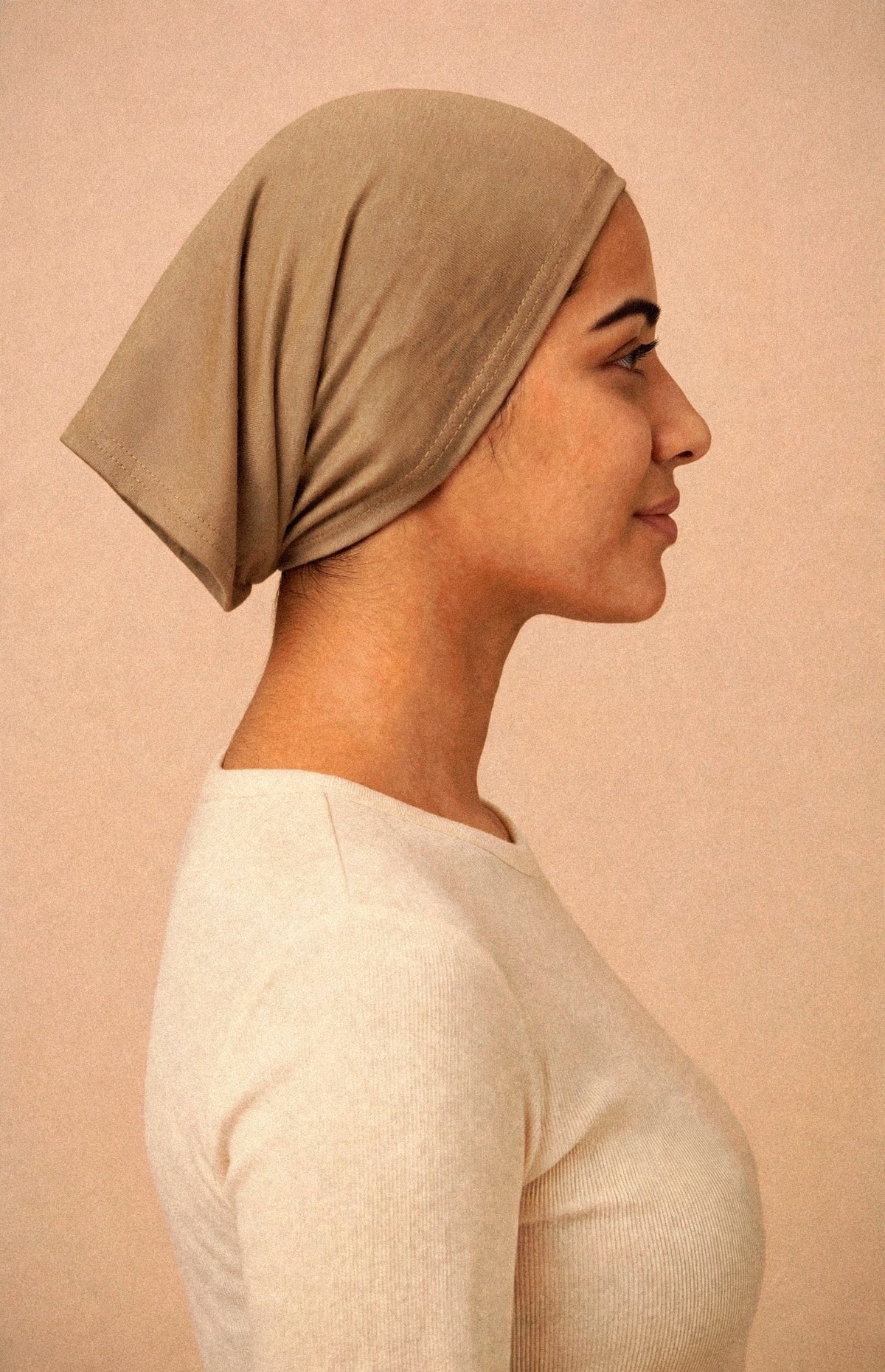 Camel - Barely On Underscarf worn by a model — side view