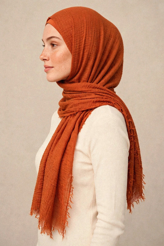 Model wearing the Carrot Orange crimple hijab - Concealed Muslimah