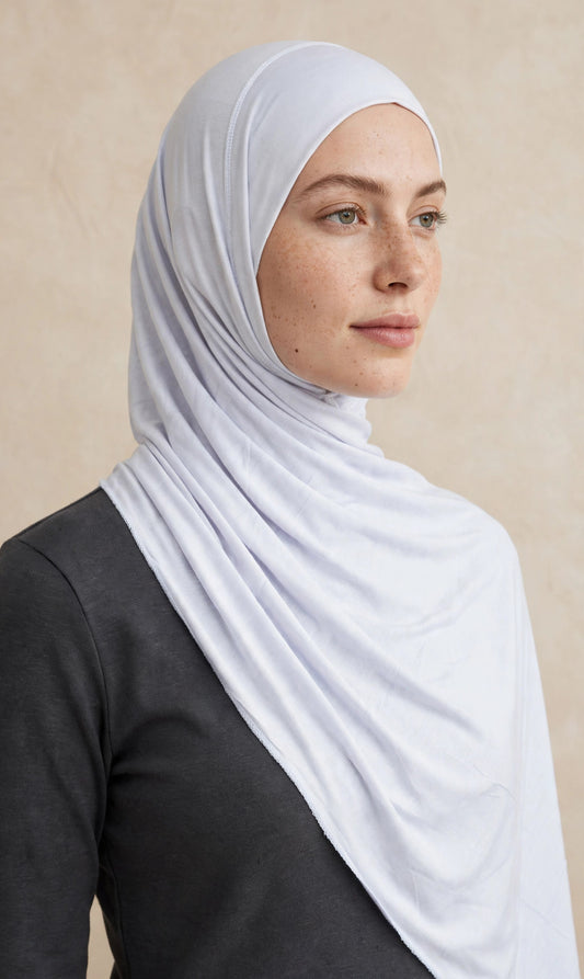 Model wearing the Chalk premium jersey hijab styled with a charcoal top - Concealed Muslimah