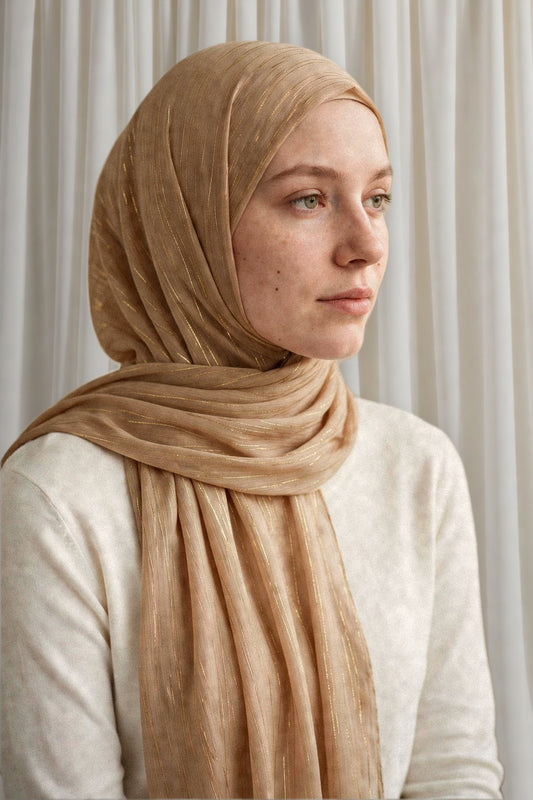 Model wearing the Champagne timeless edition hijab styled with a white top - Concealed Muslimah
