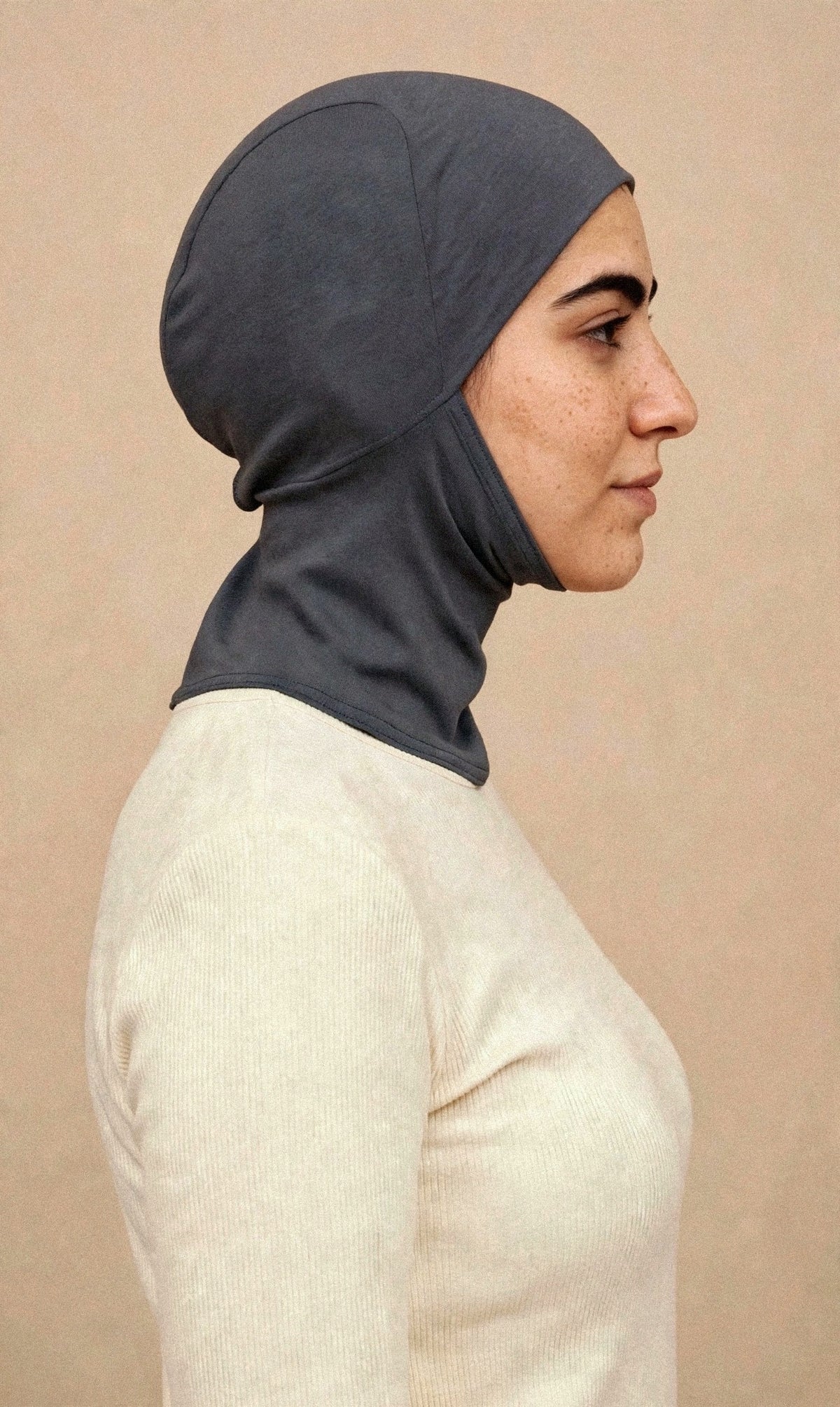 Charcoal Grey - Ninja Underscarf worn by a model — side view