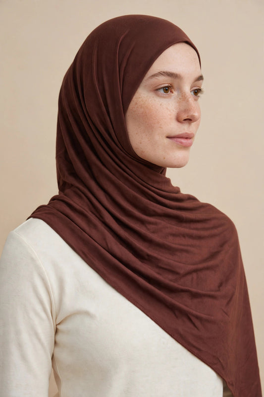Model wearing the Cocoa premium jersey hijab styled with a cream top - Concealed Muslimah