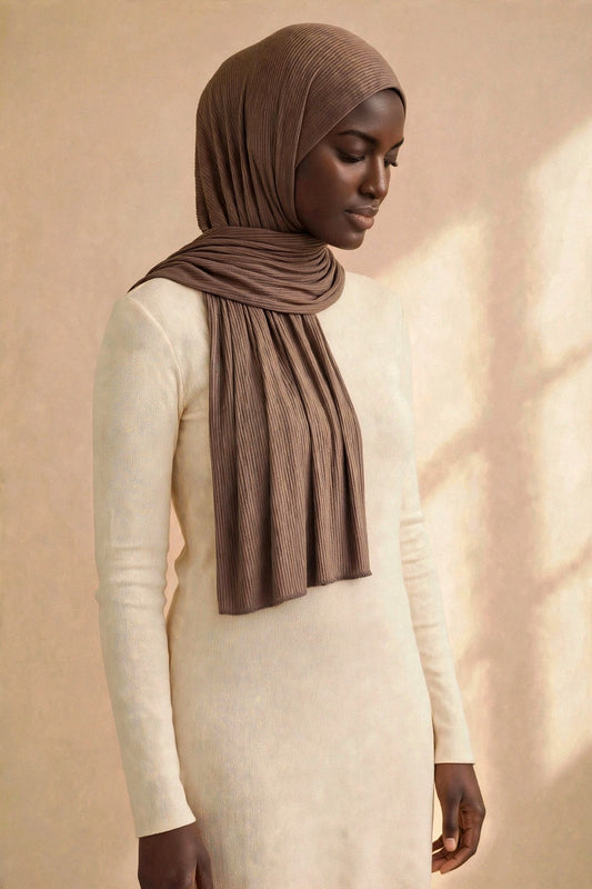 Model wearing the Coffee ribbed jersey hijab styled with a cream top - Concealed Muslimah