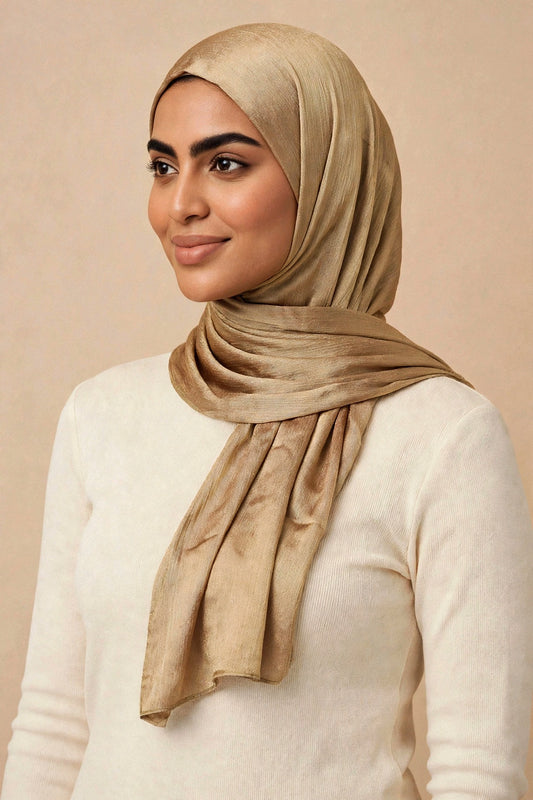 Model wearing the Copper chrome hijab styled with a cream top - Concealed Muslimah