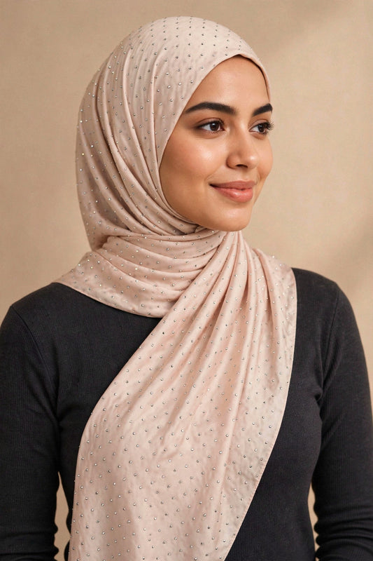 Model wearing the Cream Nude silken diamonds hijab styled with a charcoal top - Concealed Muslimah