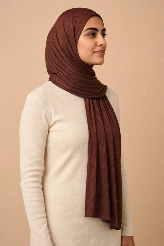 Model wearing the Dark Roast ribbed jersey hijab styled with a cream top - Concealed Muslimah