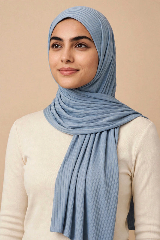 Model wearing the Denim ribbed jersey hijab styled with a cream top - Concealed Muslimah
