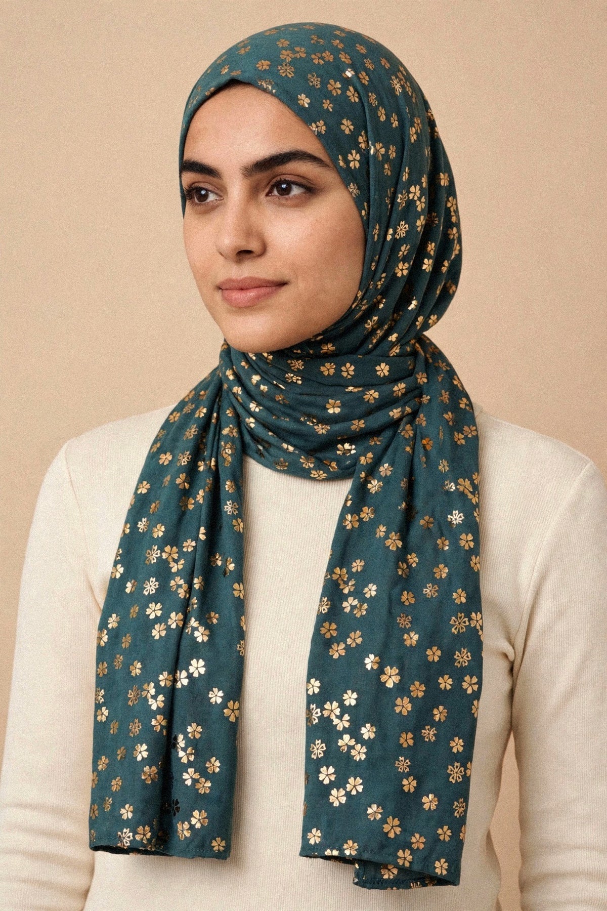 Model wearing the Emerald Green - Floral Imprints Hijab