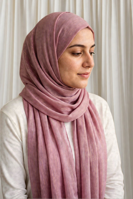 Model wearing the English Pink timeless edition hijab styled with a white top - Concealed Muslimah