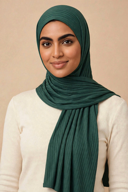 Model wearing the Forest ribbed jersey hijab styled with a cream top - Concealed Muslimah