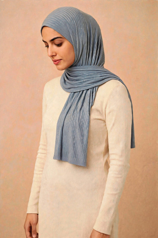 Model wearing the Grey Denim ribbed jersey hijab styled with a cream top - Concealed Muslimah