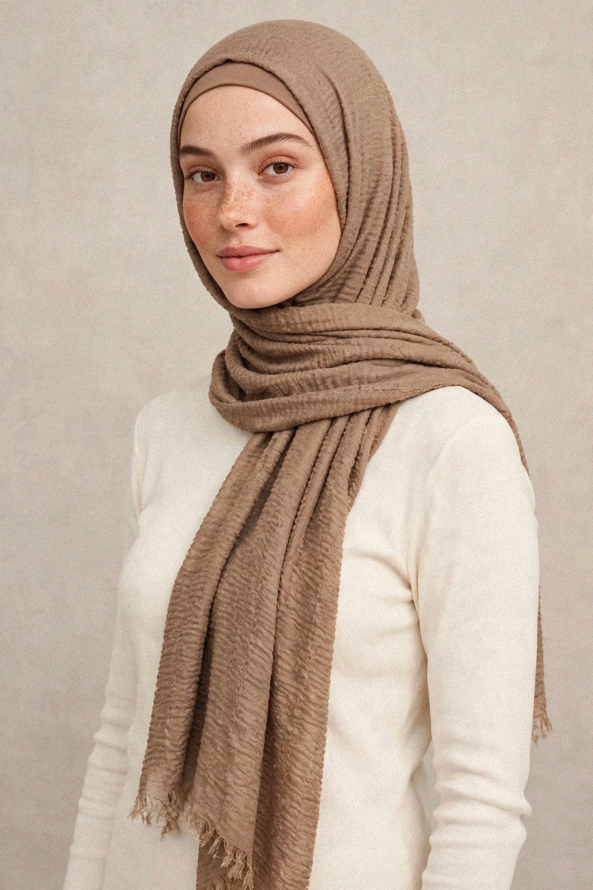 Model wearing the Hazelnut Nude crimple hijab - Concealed Muslimah