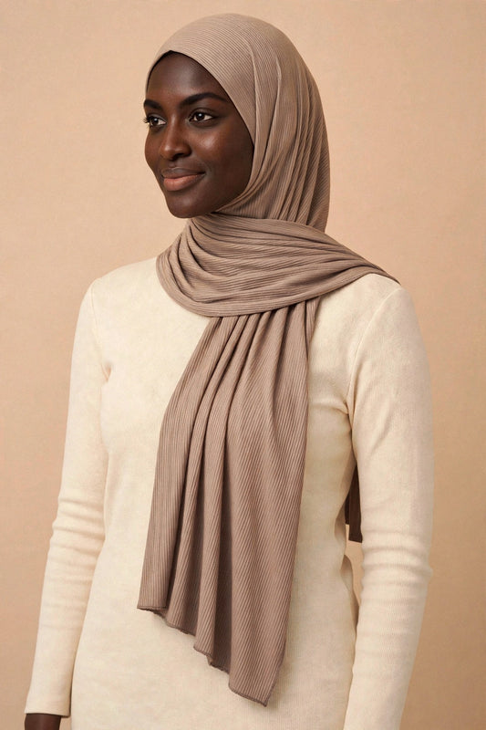 Model wearing the Light Coffee ribbed jersey hijab styled with a cream top - Concealed Muslimah