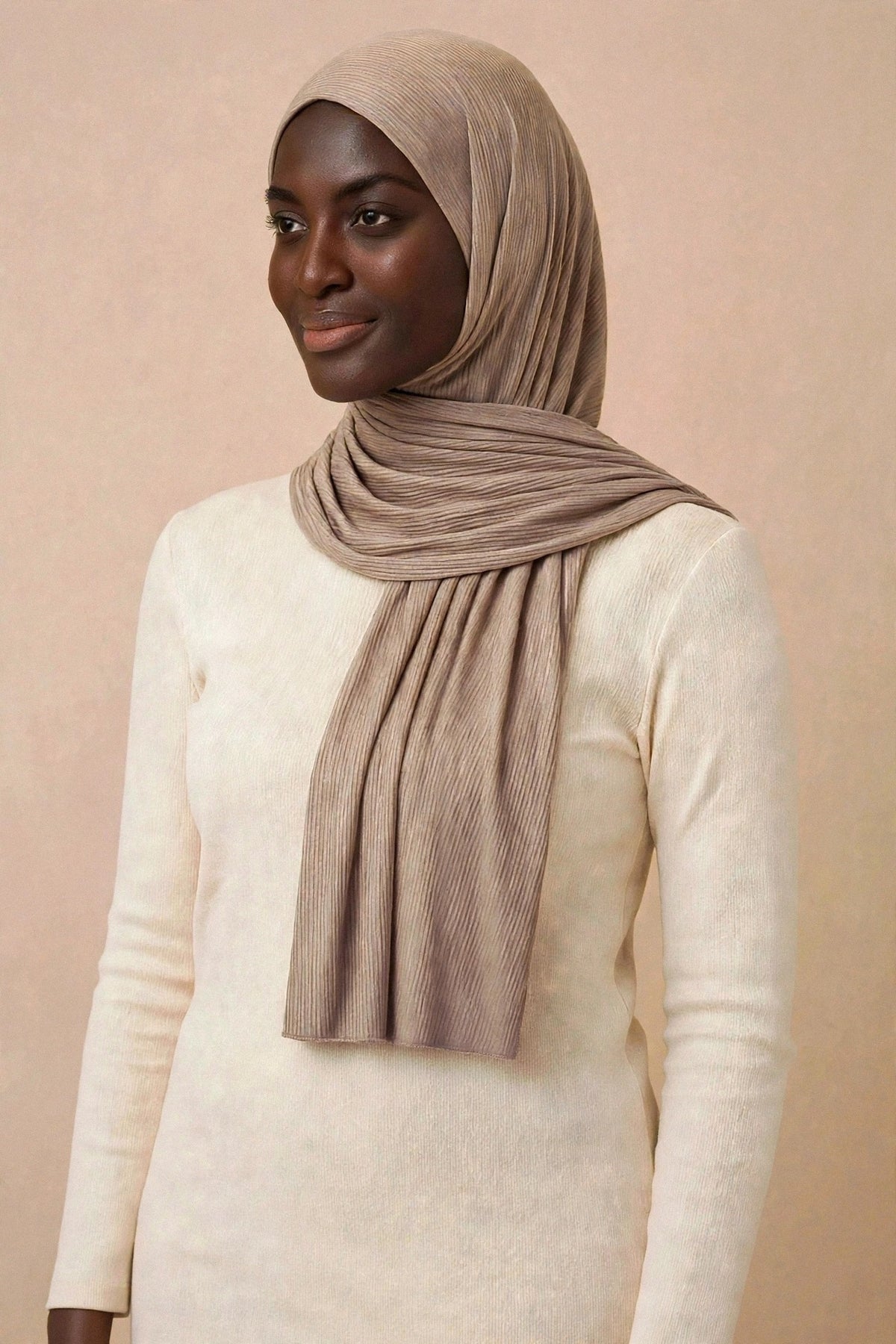 Model wearing the Light Coffee ribbed jersey hijab styled with a cream top - Concealed Muslimah