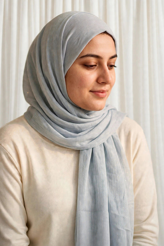 Model wearing the Light Grey timeless edition hijab styled with a white top - Concealed Muslimah