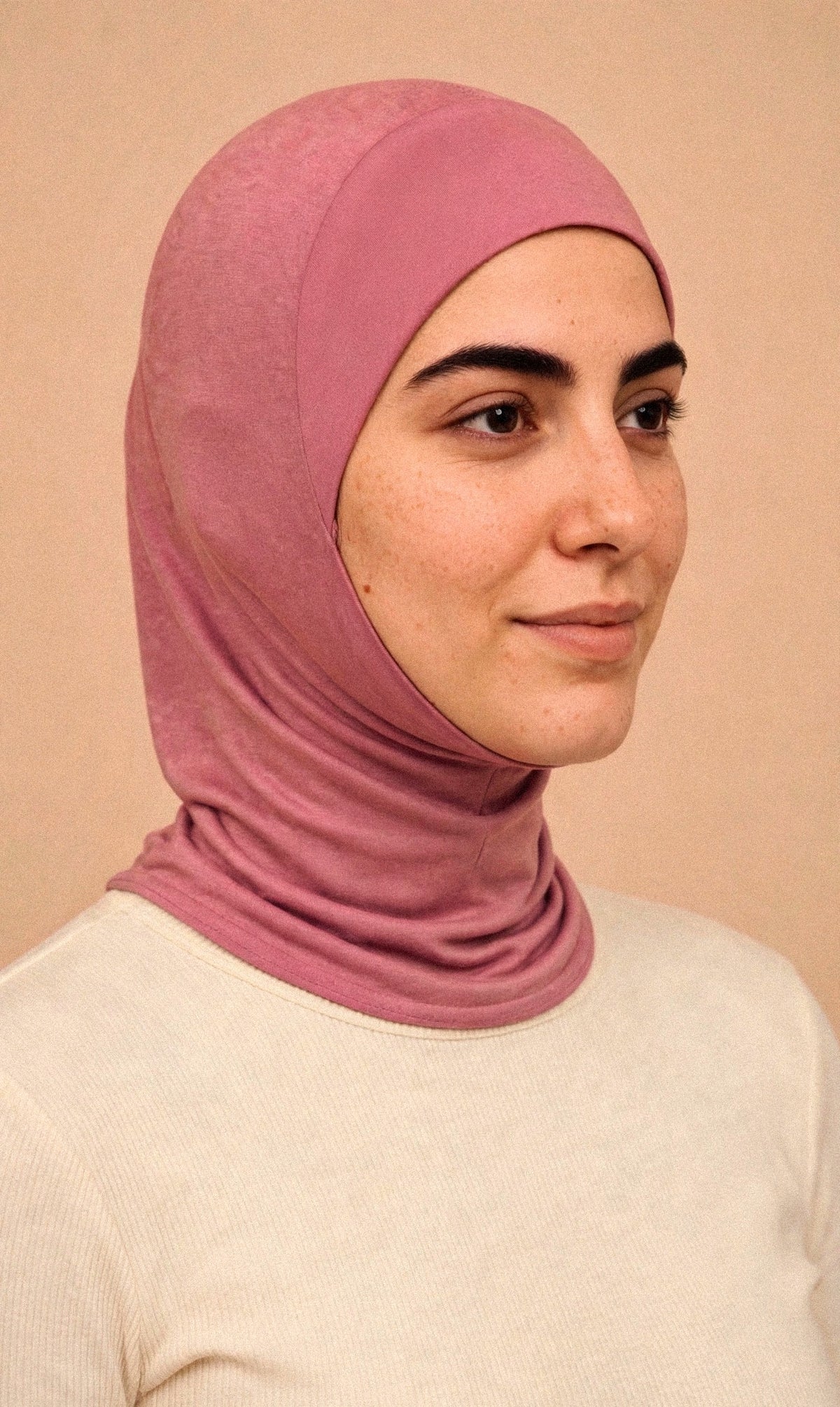 Mauve - Ninja Underscarf worn by a model — three-quarter view