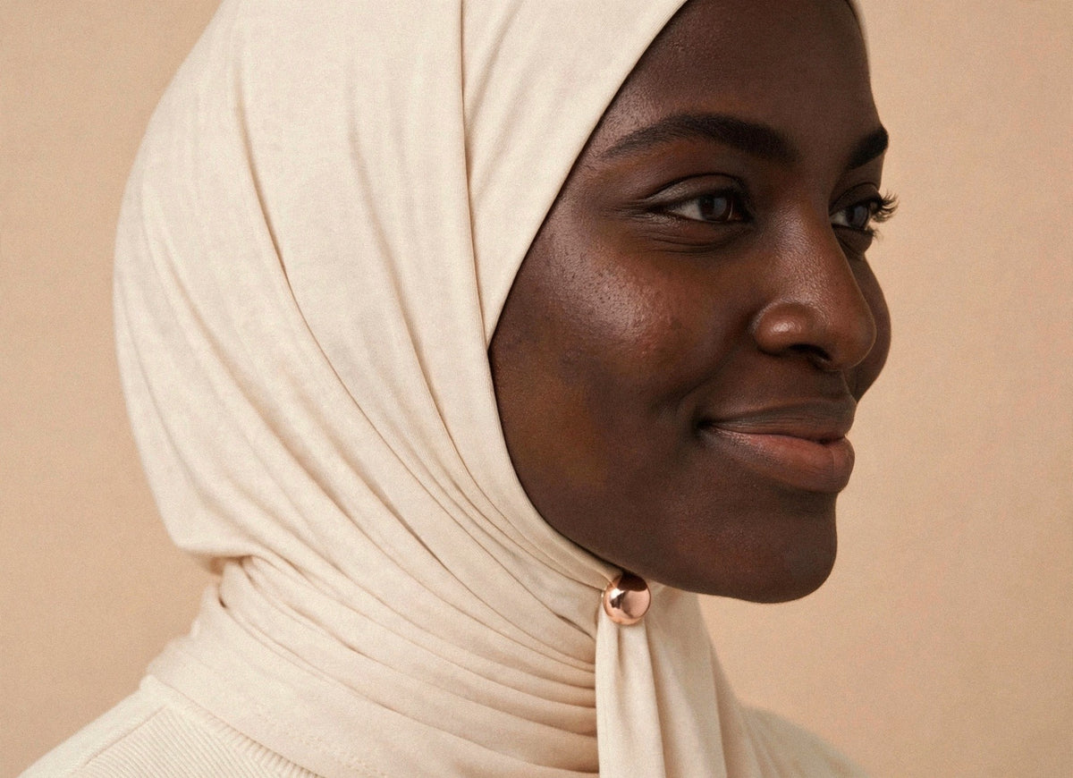 Metallic Hijab Magnets shown fastening a hijab under the chin