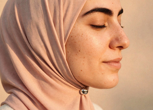 Metallic Hijab Magnets shown fastening a hijab under the chin