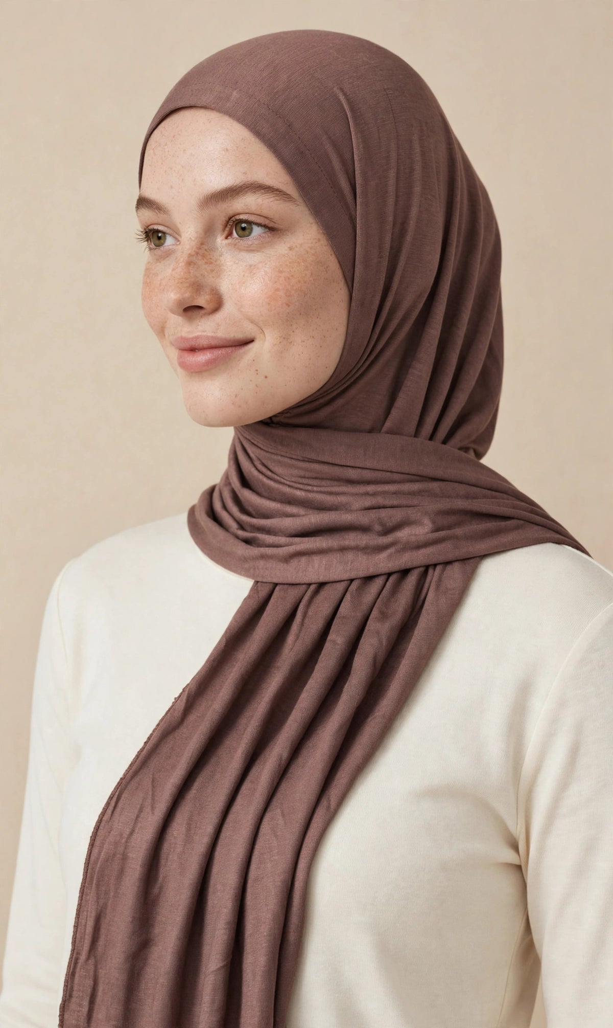 Model wearing the Milk Chocolate premium jersey hijab styled with a cream top - Concealed Muslimah