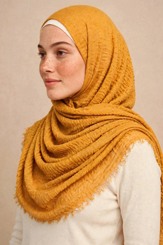 Model wearing the Mustard crimple hijab - Concealed Muslimah