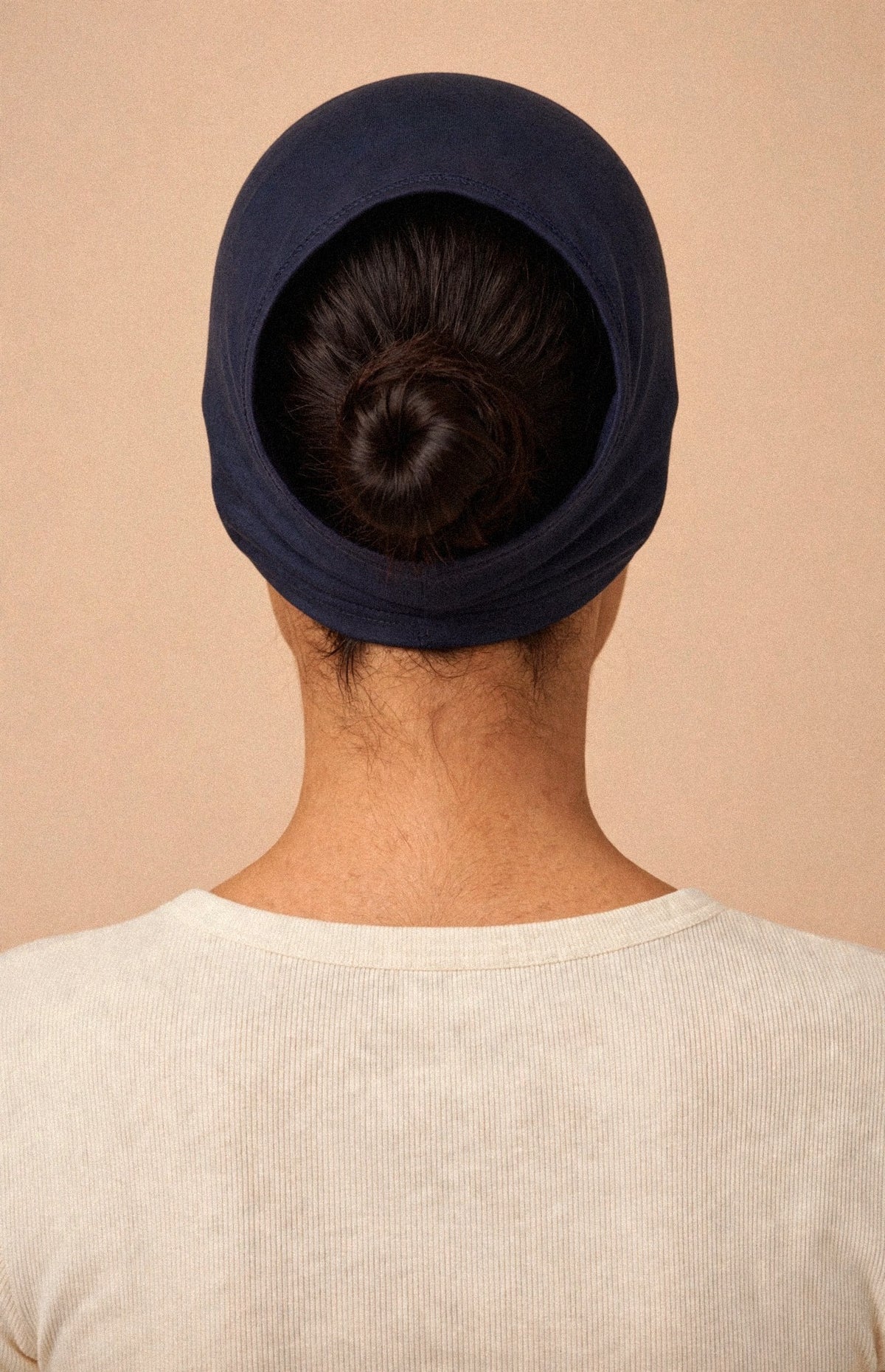 Navy Blue - Barely On Underscarf worn by a model — back view