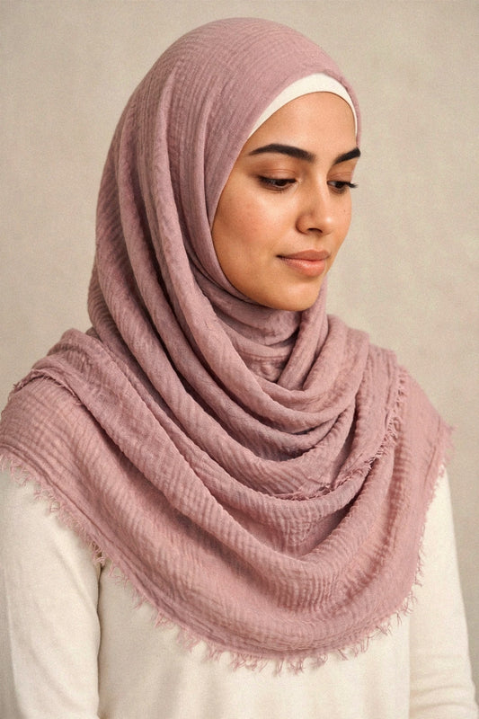 Model wearing the Peach Nude crimple hijab - Concealed Muslimah