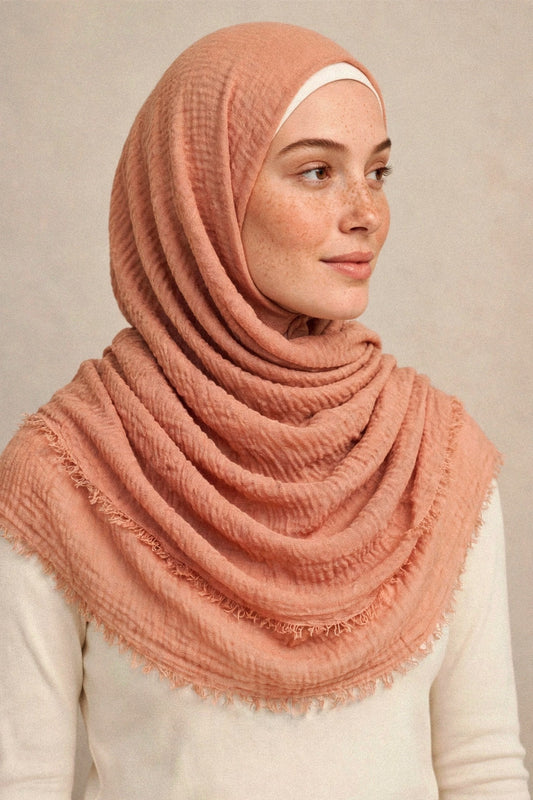 Model wearing the Peachish Nude crimple hijab - Concealed Muslimah