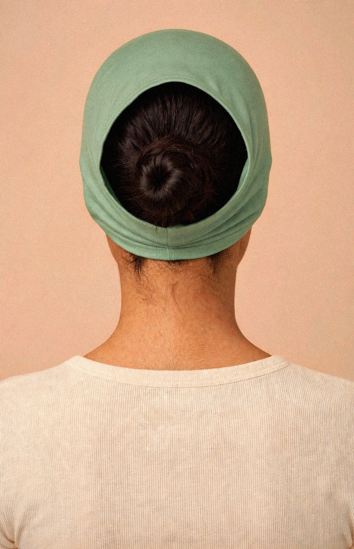 Pistachio - Barely On Underscarf worn by a model — back view
