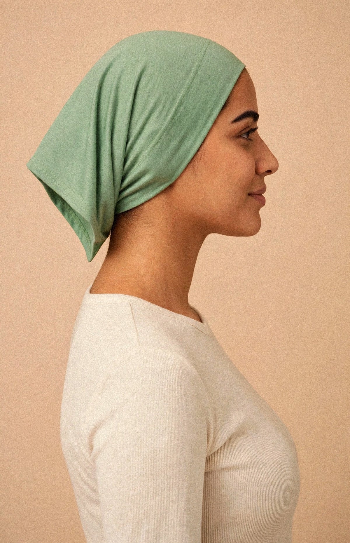 Pistachio - Barely On Underscarf worn by a model — side view