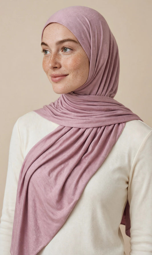 Model wearing the Rose Mauve premium jersey hijab styled with a cream top - Concealed Muslimah