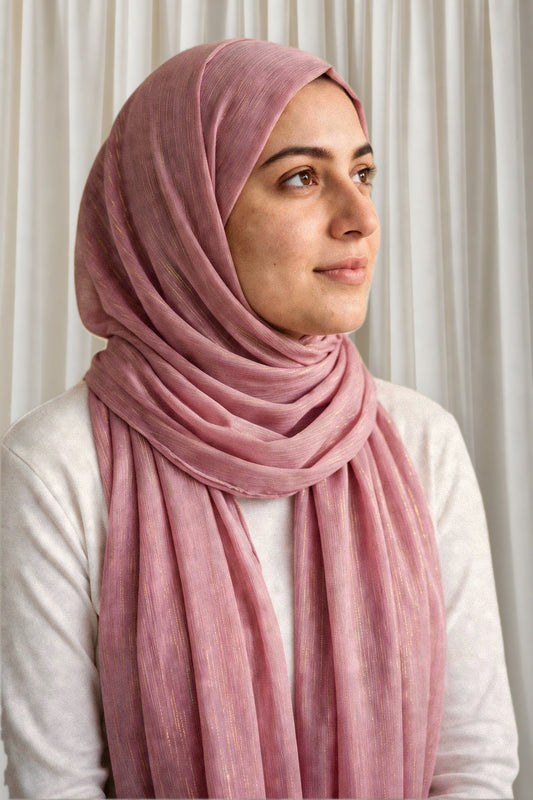 Model wearing the Rose Pink timeless edition hijab styled with a white top - Concealed Muslimah