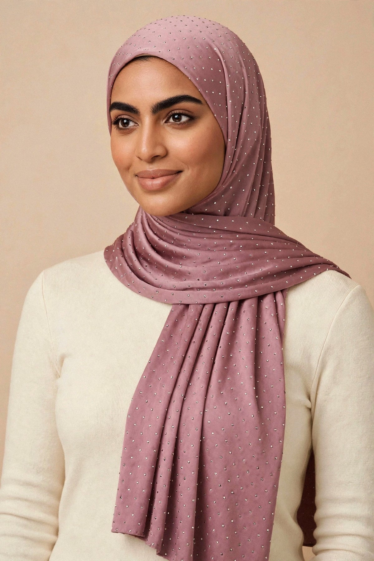 Model wearing the Rose Pink silken diamonds hijab styled with a cream top — shown on a different skin tone - Concealed Muslimah