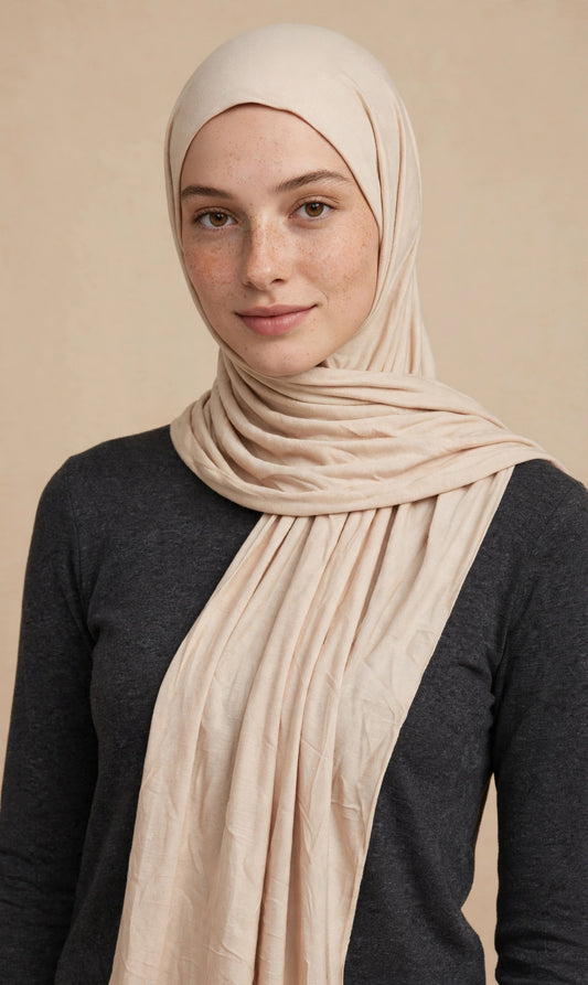 Model wearing the Sand Dunes premium jersey hijab styled with a charcoal top - Concealed Muslimah
