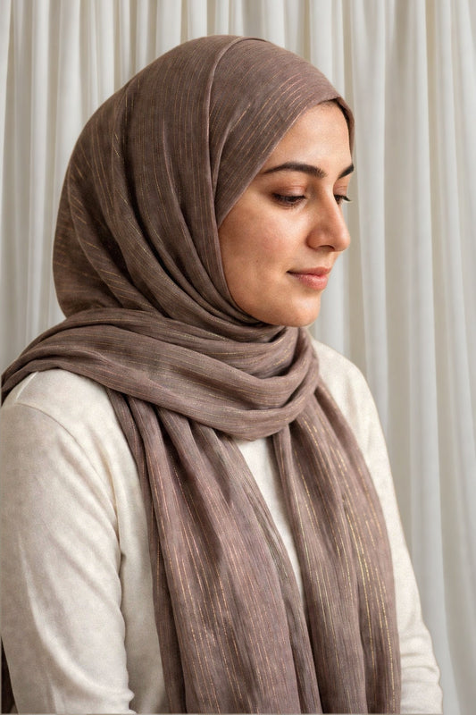 Model wearing the Taupe timeless edition hijab styled with a white top - Concealed Muslimah