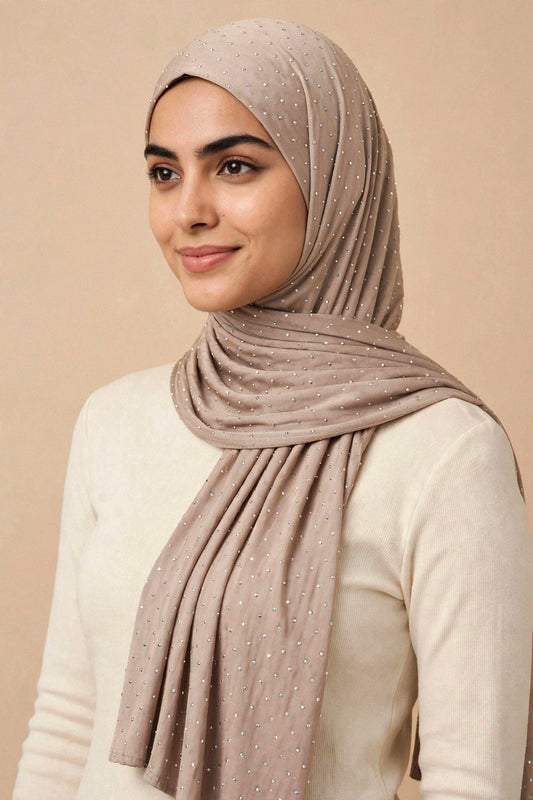 Model wearing the Taupe silken diamonds hijab styled with a cream top - Concealed Muslimah