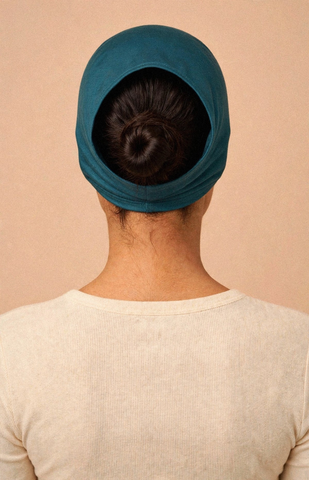 Teal - Barely On Underscarf worn by a model — back view