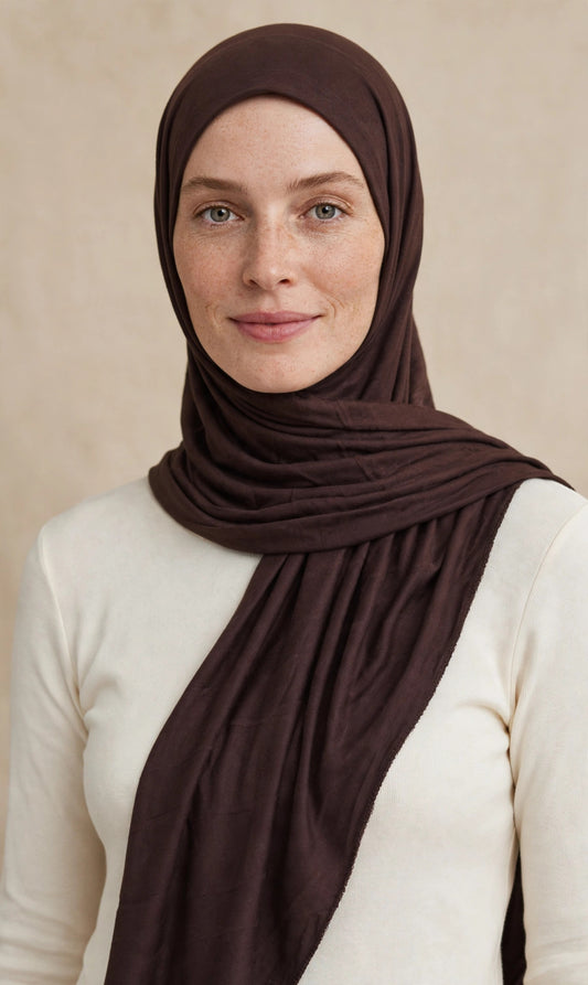 Model wearing the Umber premium jersey hijab styled with a cream top - Concealed Muslimah