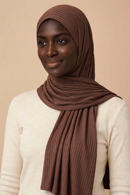 Model wearing the Warm Chocolate ribbed jersey hijab styled with a cream top - Concealed Muslimah